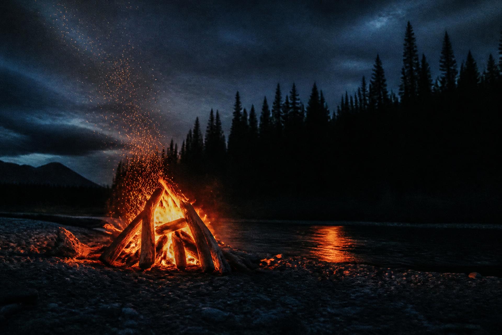 Driftwood campfire on the Yukon at twilight